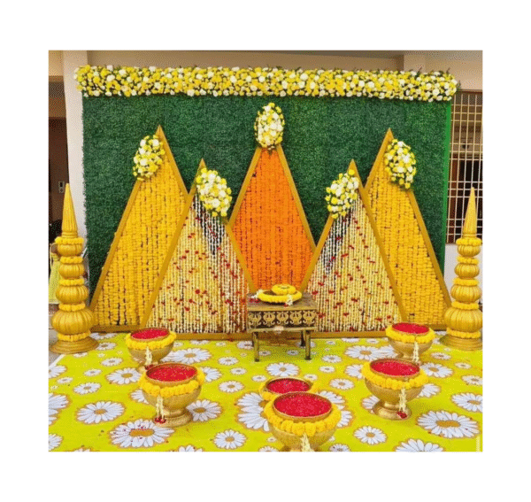 A beautiful haldi ceremoney stage decorated marigold and Rajnigandha flowers.